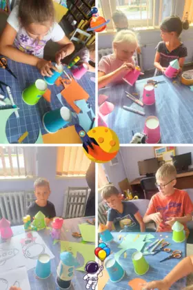 Dzieci w trakcie klejenia kubeczkowych rakiet.