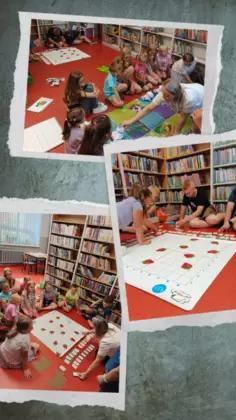 Zdjęcia dzieci z kodowanie z robotami.