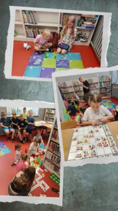 Zdjęcia dzieci z kodowanie z robotami.